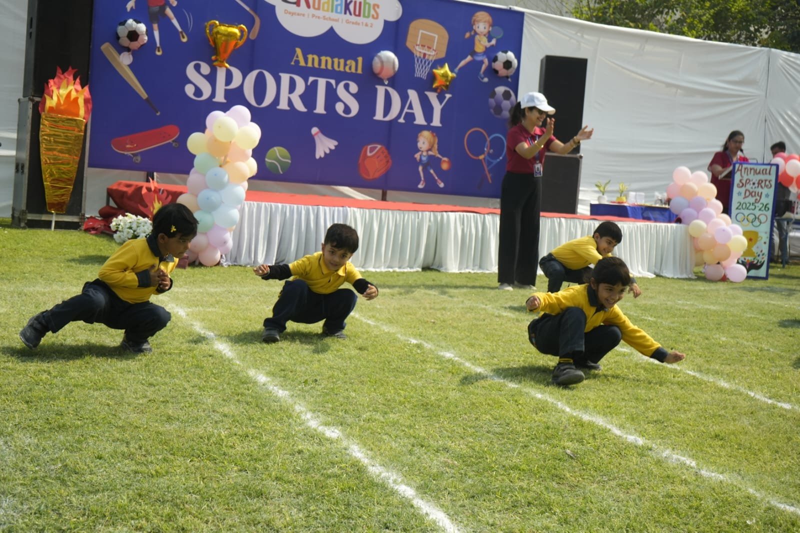 Students playing soccer on the sports field