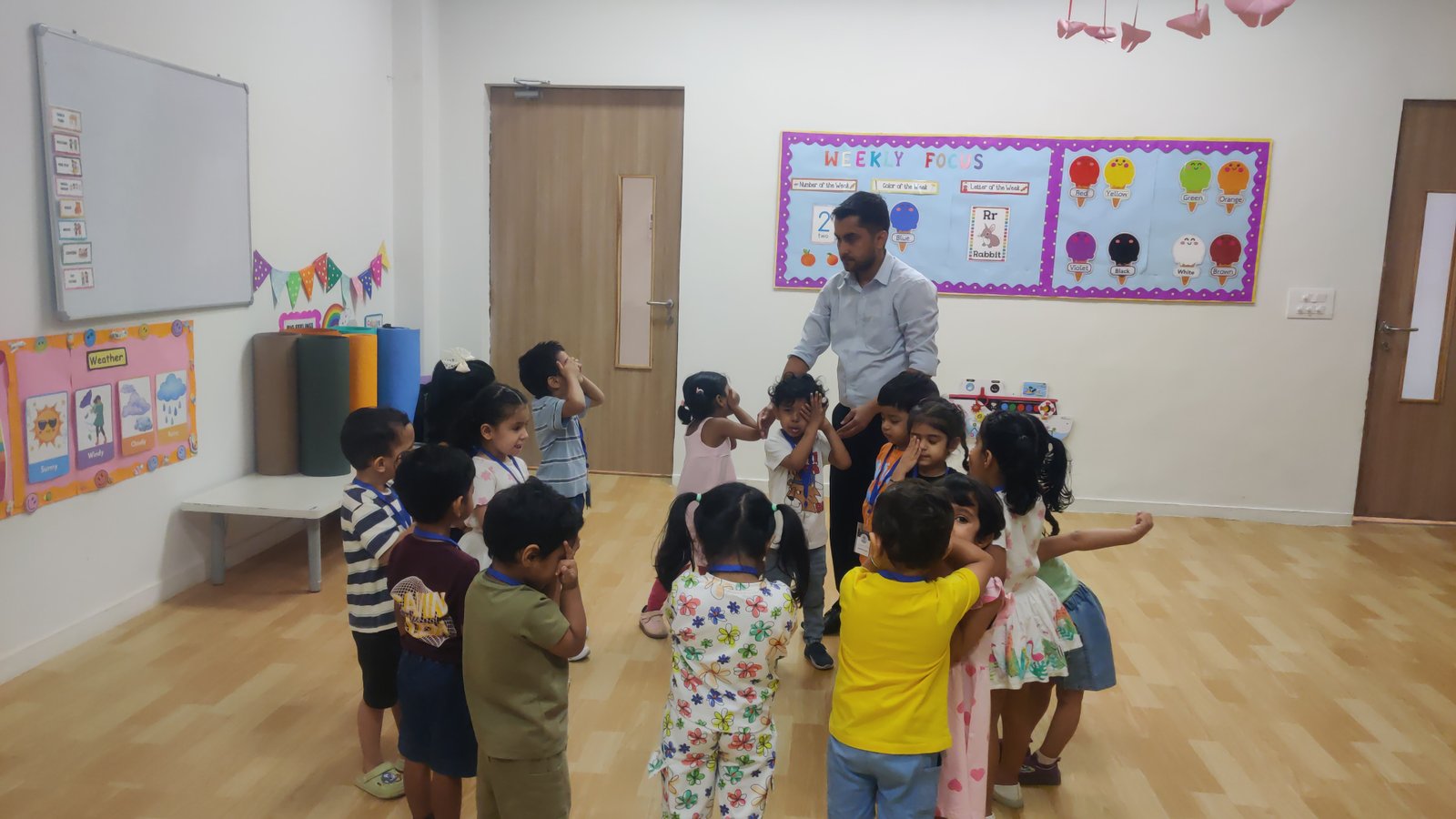 Children enjoying creative learning experiences during summer camp at Kualakubs World School