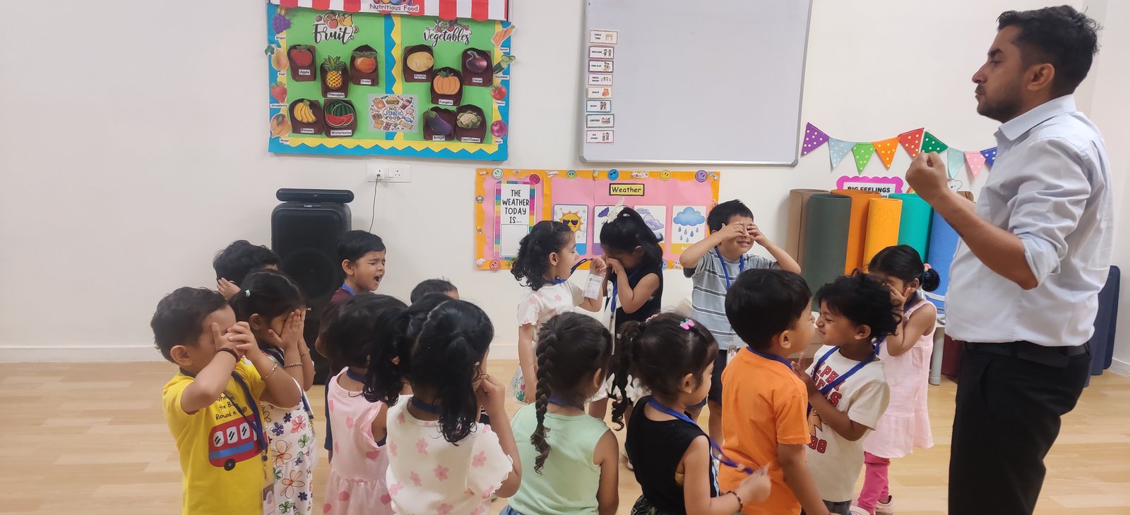 Students involved in hands-on educational activities at the summer camp at Kualakubs World School